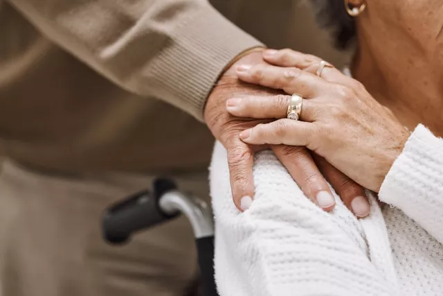 Love, disability and hands of retirement couple with care, gratitude and support in marriage. Unity, respect and senior people holding hands for bonding, appreciation and togetherness zoom.